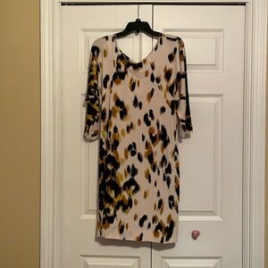 This cream, gold, and black dress is perfect for work and church.